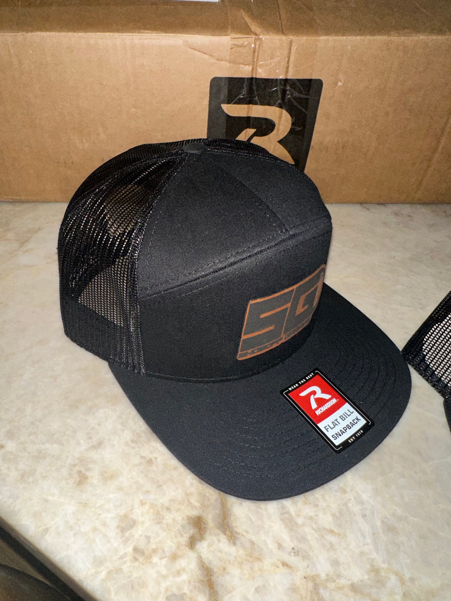 Black Flatbill Snapback Leather Patch Hat
